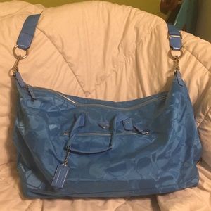 Light blue Coach duffle bag